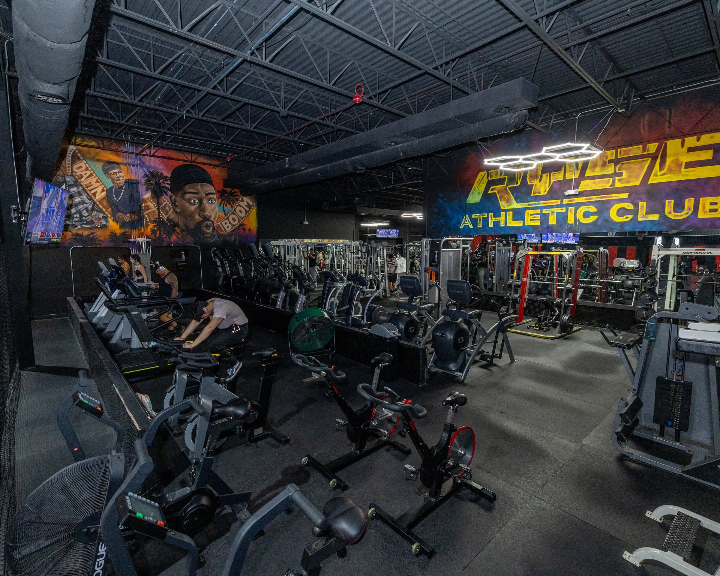 Wide view of the training floor and mural wall